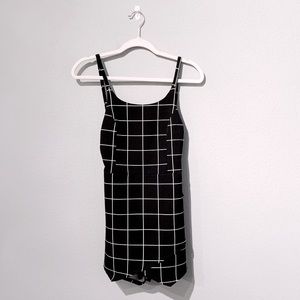 BLUE BLUSH black and white checkered romper.